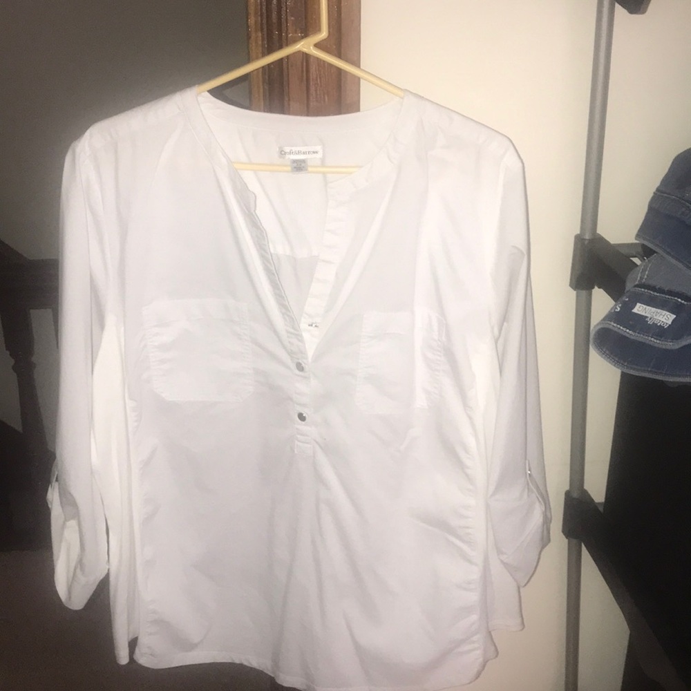 Half button up blouse with buttoned sleeves